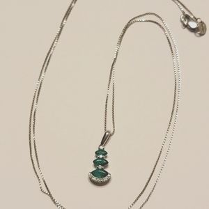 Emerald and Diamond pendant on 14 k chain